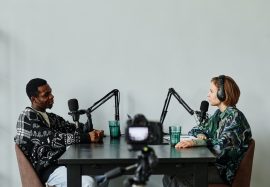 two-people-recording-podcast-side-view-1.jpg